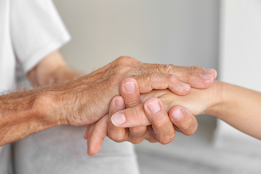 Image of hands appreciative of the hospice care they are receiving